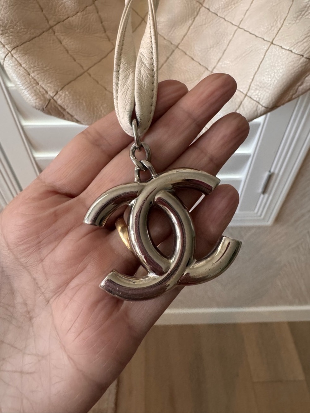CHANEL Cream Quilted Drawstring Hobo with Charm - Picture 4 of 13